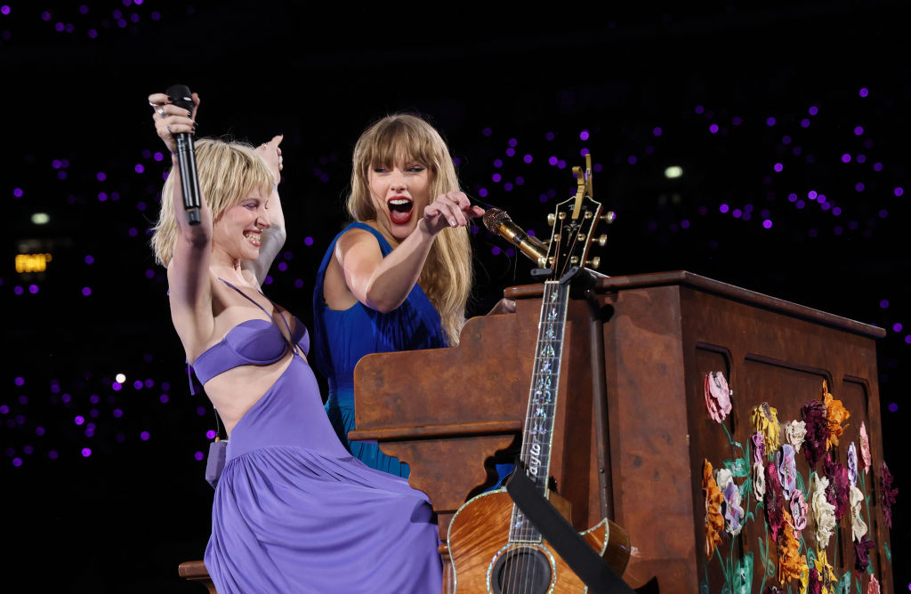Taylor Swift on piano with Hayley Williams at a London show on the Eras Tour