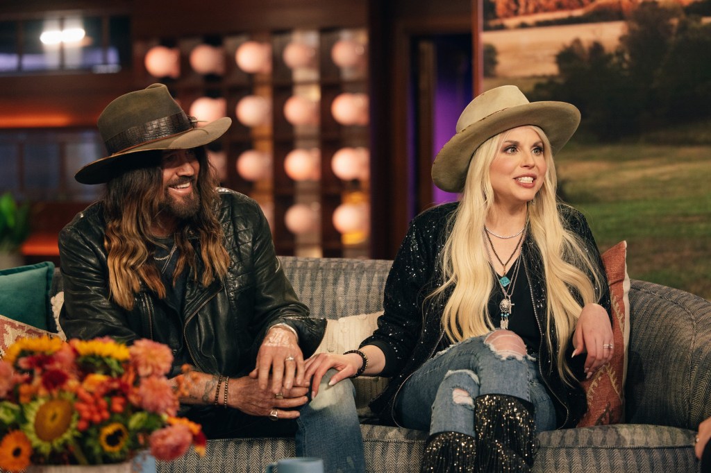 THE KELLY CLARKSON SHOW -- Episode 7I011 -- Pictured: (l-r) Billy Ray Cyrus, Firerose -- (Photo by: Weiss Eubanks/NBCUniversal via Getty Images) 13626375 EXCLUSIVE: The surprising secret past of Billie Ray Cyrus's Aussie wife Firerose - and how she once looked very VERY different
