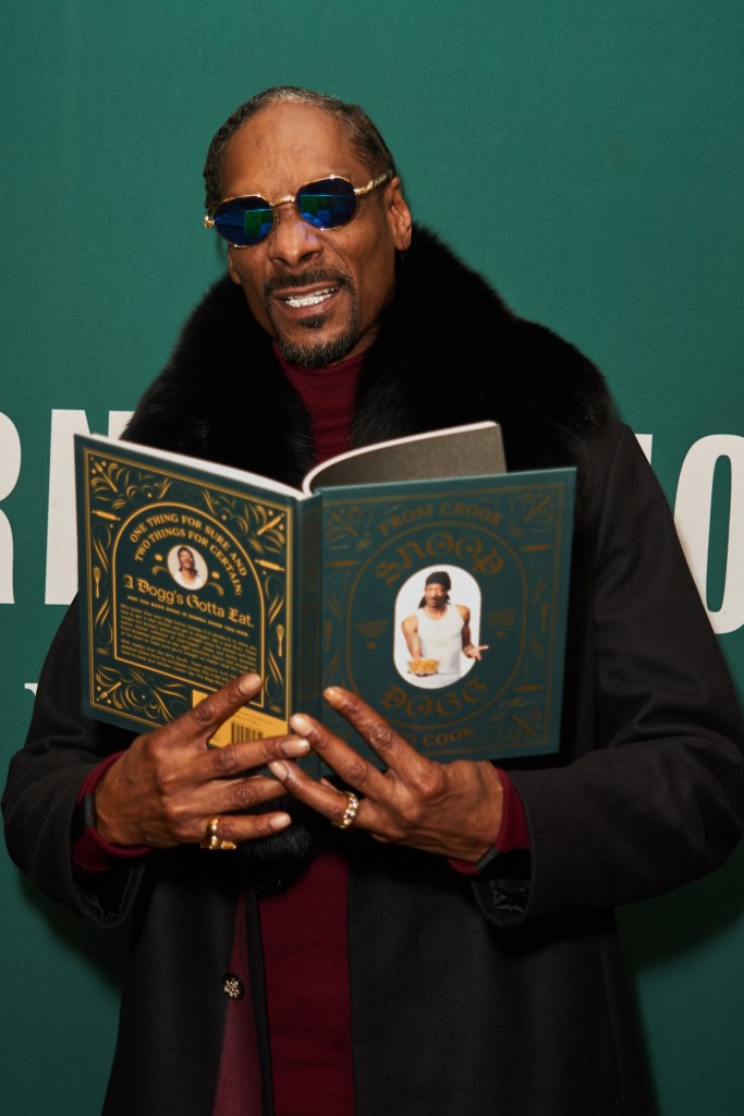 Snoop Dogg with his cookbook