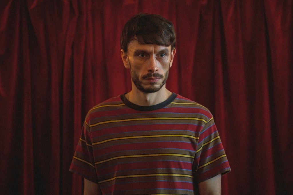 Richard Gadd wearing a striped t-shirt in a scene from Netflix hit Baby Reindeer