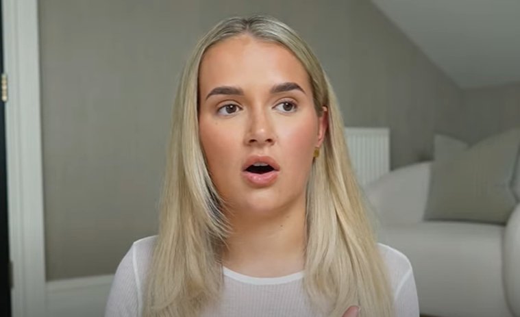 A still of Molly-Mae Hague talking on her YouTube channel