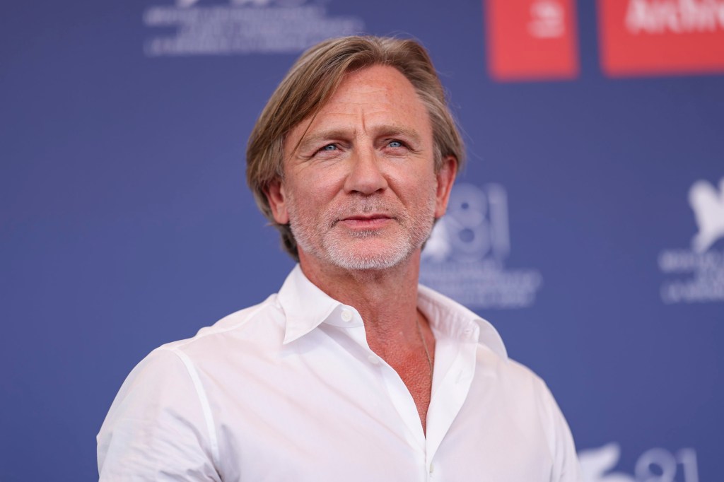 Daniel Craig poses for photographers at the photo call for the film 'Queer' at the Venice film festival