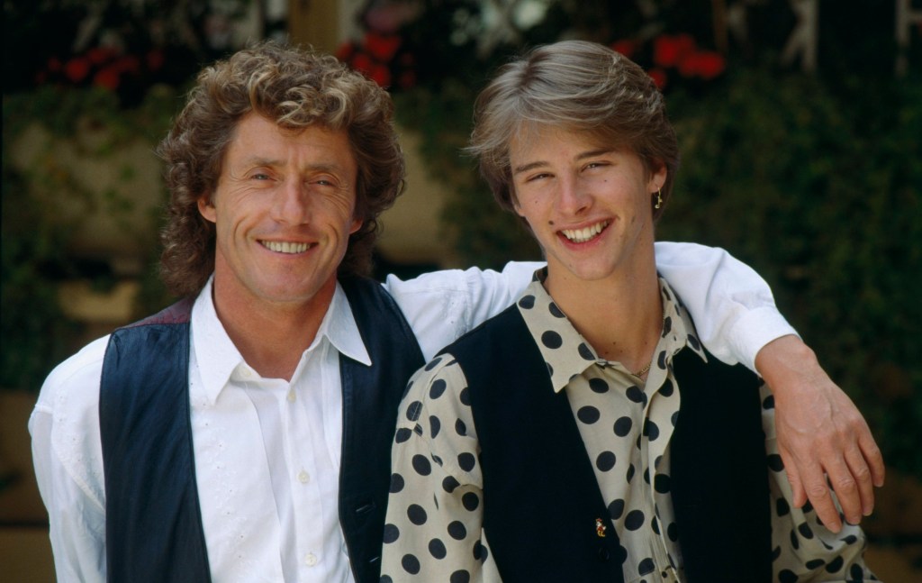 Singers Roger Daltrey and Chesney Hawkes pose for a photo in suits at the Cannes film festival