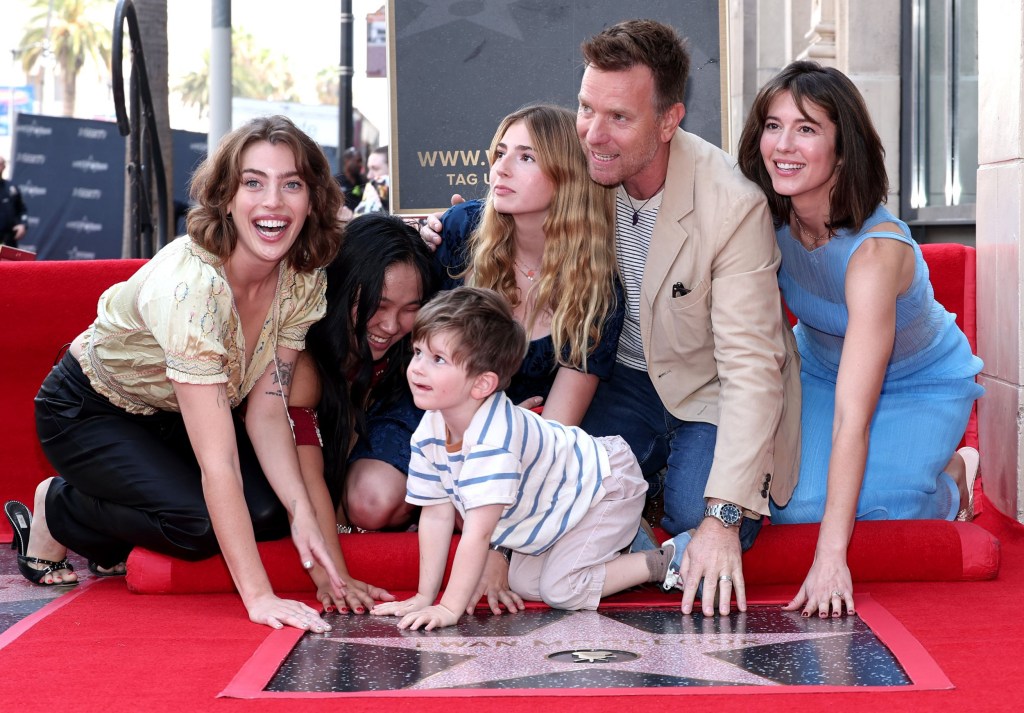 Clara McGregor, Jamyan McGregor, Esther Rose McGregor. Ewan McGregor, Laurie McGregor and Mary Elizabeth Winstead pose with their hands on Ewan's Hollywood Walk of Fame star