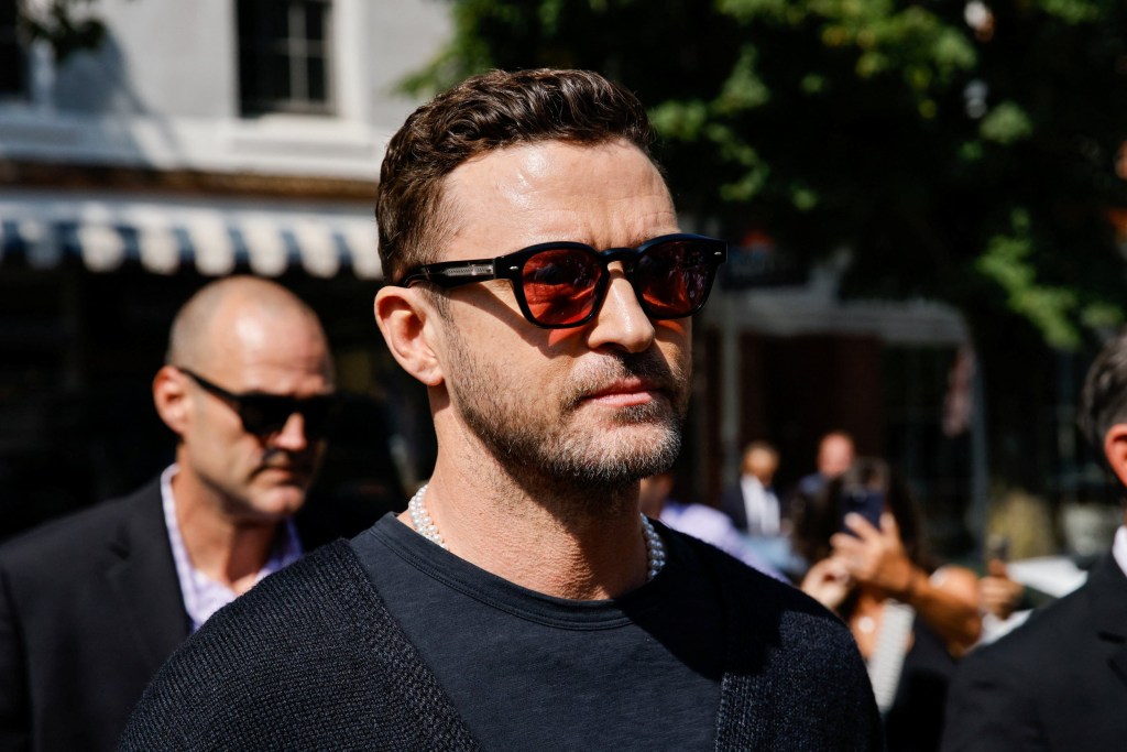 Justin Timberlake arrives to appear in court in Sag Harbor, New York, wearing sunglasses 