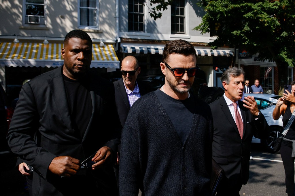 Singer Justin Timberlake arrives to appear in court in Sag Harbor wearing jumper and sunglasses 