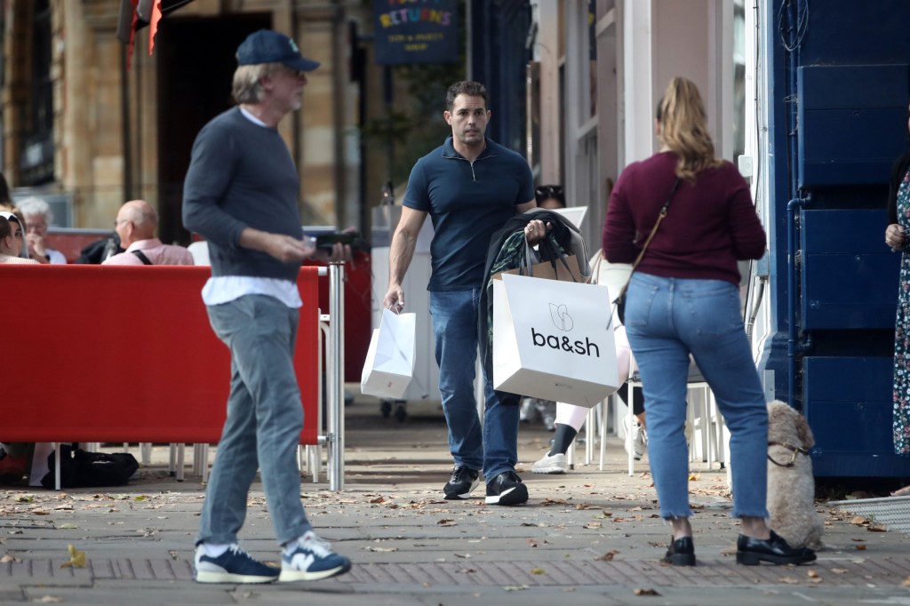 Daniel Craig walks in front of Kelly Brook and husband Jeremy Parisi in London 