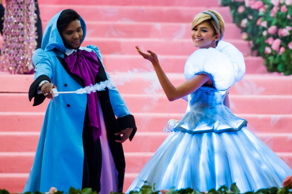 Zendaya and Law Roach dressed in Cinderella-inspired blue outfits on the 2019 Met Gala pink carpet