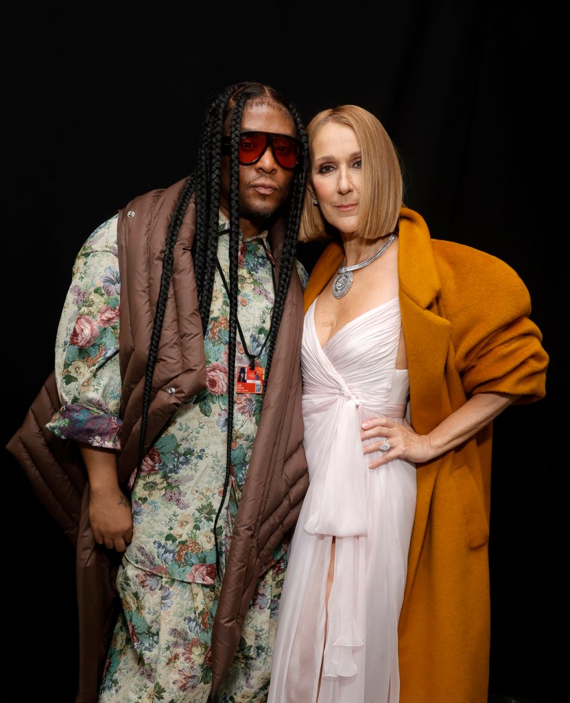 Law Roach and Celine Dion pose together looking straight at the camera