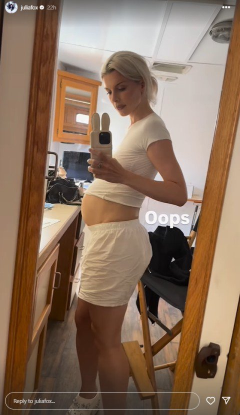 Julia Fox mirror selfie with a fake baby bump