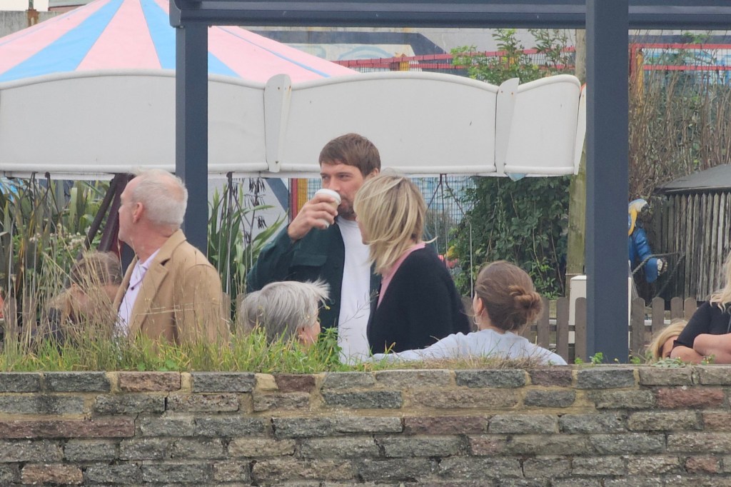 Zoe Ball spotted with a group of people including ex-husband at a café in Hove 