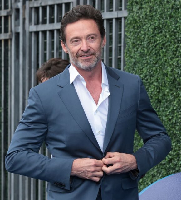 Hugh Jackman in a grey suit as he attends the 2024 US Open Tennis Championships