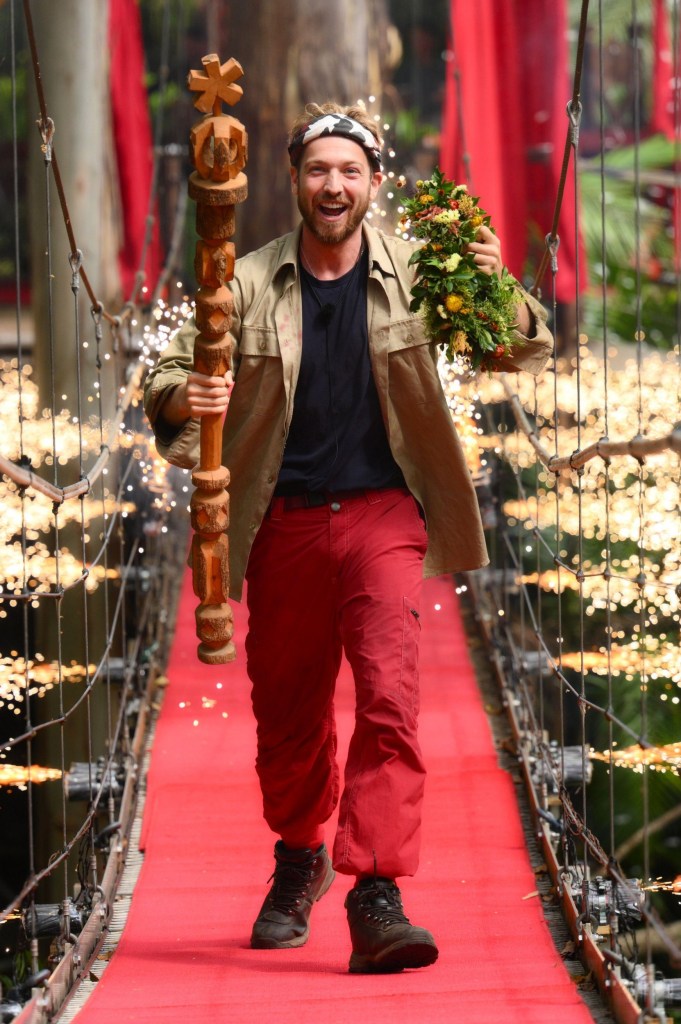 Sam Thompson after being crowned the winner of I'm A Celebrity... Get Me Out Of Here!, walking along the red carpet bridge 