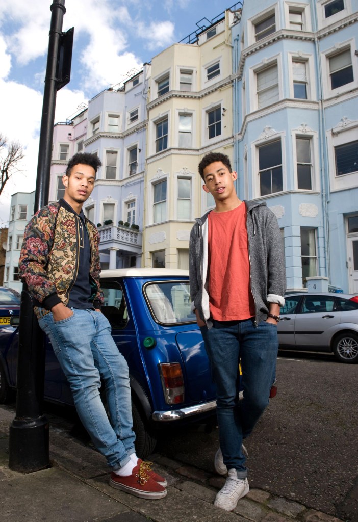 Rizzle Kicks pose for a photo on the street