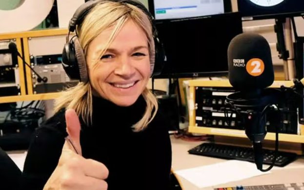 Zoe Ball gives thumbs up with headphones on in radio studio as she returns to Radio 2