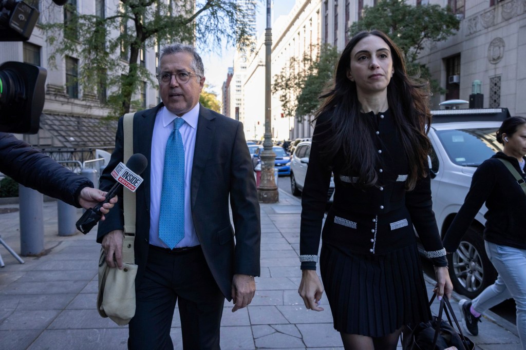 Attorney Marc Agnifilo, left, and Teny Geragos arrive at court