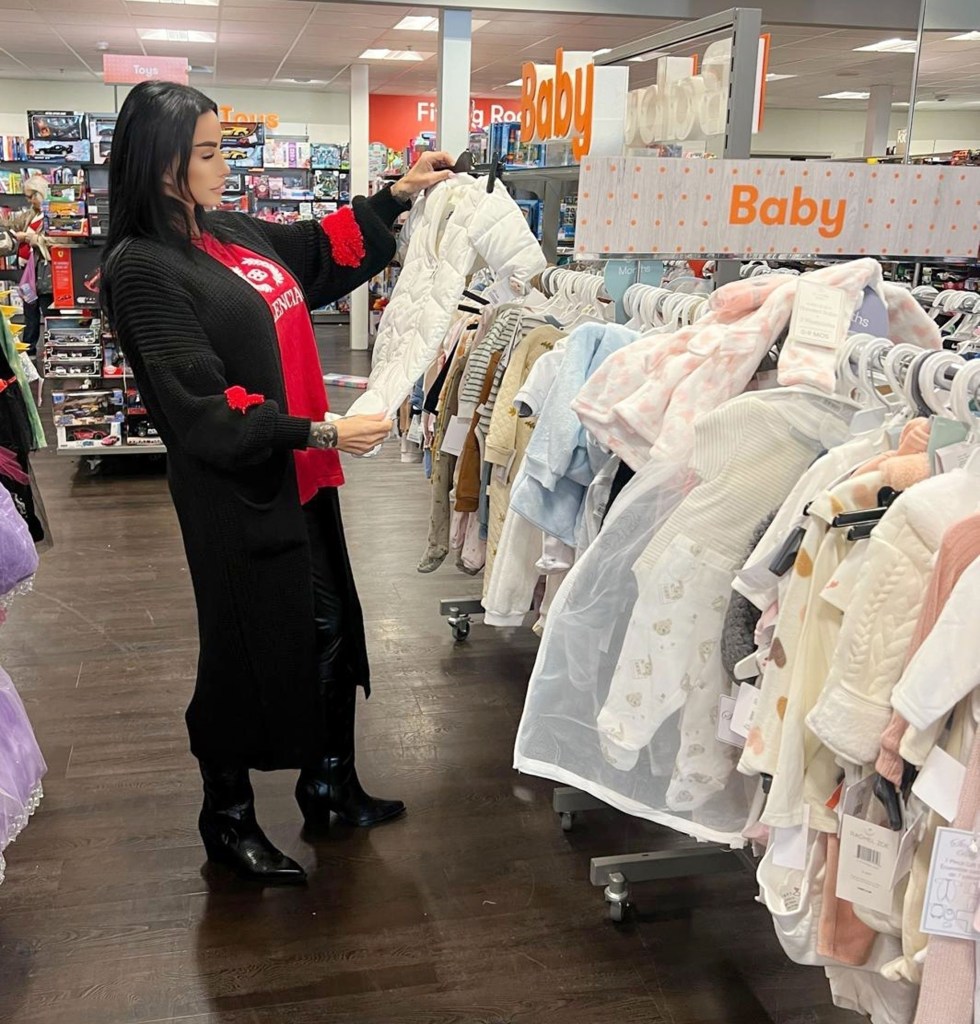 Katie Price snapped in TK Maxx looking at baby clothes