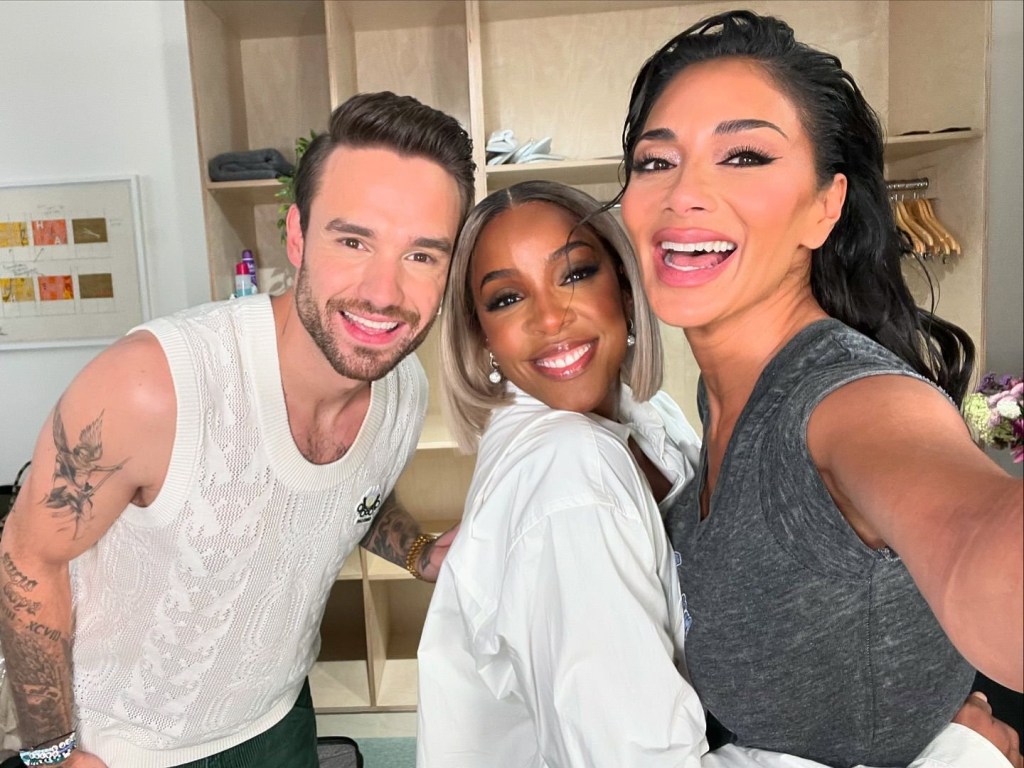 Liam Payne, Kelly Rowland and Nicole Scherzinger smile together during Building The Band